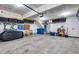 Spacious basement area with storage bins, organization racks, and ample open space at 12193 W 51St Ave, Wheat Ridge, CO 80033