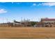 A large grassy field near the community, with a recreation center, playground, and other amenities at 12193 W 51St Ave, Wheat Ridge, CO 80033