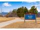 City of Arvada Skyline Park sign with walking path and trees, near the community at 12193 W 51St Ave, Wheat Ridge, CO 80033