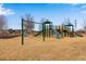 Community playground area with swings, slides and other recreational equipment, nearby the community at 12193 W 51St Ave, Wheat Ridge, CO 80033