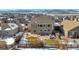 Aerial view of house and backyard, showcasing surrounding homes and mountain views at 9170 Fig St, Arvada, CO 80005