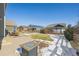 Landscaped backyard with patio and fire pit at 9170 Fig St, Arvada, CO 80005