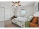 Charming bedroom with a queen-size bed and built-in closet at 9170 Fig St, Arvada, CO 80005