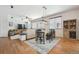 Dining area with table, chairs, and hardwood floors at 9170 Fig St, Arvada, CO 80005