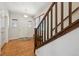 Hardwood floor entryway with staircase and access to other rooms at 9170 Fig St, Arvada, CO 80005