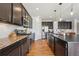 Modern kitchen with granite countertops and stainless steel appliances at 9170 Fig St, Arvada, CO 80005