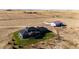 Aerial view of house with backyard and detached barn at 26100 County Road 5, Elizabeth, CO 80107