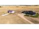 Aerial view of house and barn with surrounding land at 26100 County Road 5, Elizabeth, CO 80107