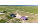Beautiful home and outbuilding sit on a stunning lot, perfect for enjoying the outdoors or for additional storage and workspace at 26100 County Road 5, Elizabeth, CO 80107