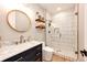 Modern bathroom with hexagon tile shower and floating vanity at 26100 County Road 5, Elizabeth, CO 80107