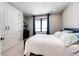 Cozy bedroom with a comfortable bed, natural light, and closet space for storage at 26100 County Road 5, Elizabeth, CO 80107