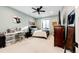 Comfortable bedroom with a ceiling fan, serene wall color, and ample natural light at 26100 County Road 5, Elizabeth, CO 80107