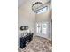 Inviting entryway with brick floors, tall ceilings, and modern decor at 26100 County Road 5, Elizabeth, CO 80107