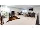 Comfortable living room space with carpeted floors, natural light, and versatile furniture arrangement options at 26100 County Road 5, Elizabeth, CO 80107