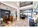 Open-concept view of the dining and living rooms showing an open floor plan at 26100 County Road 5, Elizabeth, CO 80107