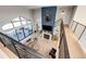 Elevated view of living room and fireplace, seamlessly blending indoor comfort with outdoor enjoyment at 26100 County Road 5, Elizabeth, CO 80107