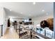 Upper-level loft area with a view of the open-concept living space, ideal for a home office or recreation area at 26100 County Road 5, Elizabeth, CO 80107