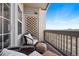 Relaxing balcony area with comfortable seating and open views, ideal for enjoying outdoor living at 1575 Olympia Cir # 303, Castle Rock, CO 80104