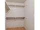 Walk-in closet providing ample storage with built-in shelving, perfect for organized wardrobe management at 2629 Wisteria Dr, Erie, CO 80516