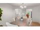 Open concept dining room showcases an open floor plan and access to the kitchen, living room, and stairway at 2629 Wisteria Dr, Erie, CO 80516