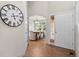 Bright foyer boasts wood floors and dining room views at 2629 Wisteria Dr, Erie, CO 80516