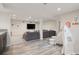 Finished basement features an entertainment area, stylish flooring, and play space at 2945 E 26Th Avenue Pkwy, Denver, CO 80205