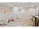 Finished basement boasts recessed lighting, neutral walls, and sleek wet bar area at 2945 E 26Th Avenue Pkwy, Denver, CO 80205