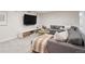 Comfortable living room offers a large sectional sofa and media console at 2945 E 26Th Avenue Pkwy, Denver, CO 80205