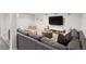 Cozy living room features a large sectional sofa and entertainment area at 2945 E 26Th Avenue Pkwy, Denver, CO 80205