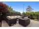 Outdoor patio area with comfortable seating, perfect for entertaining and relaxation amongst lush greenery at 2945 E 26Th Avenue Pkwy, Denver, CO 80205
