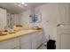 Bathroom with yellow vanity and shower/tub combo at 6495 E Happy Canyon Rd # 88, Denver, CO 80237