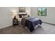Cozy bedroom featuring natural light and comfortable furnishings at 7379 S Gore Range Rd # 304, Littleton, CO 80127