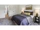 Comfortable bedroom with soft carpet, neutral wall color, and closet space at 7379 S Gore Range Rd # 304, Littleton, CO 80127
