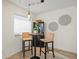 Cozy dining nook with a modern pendant light fixture and stylish decor at 7379 S Gore Range Rd # 304, Littleton, CO 80127