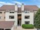 Well-maintained condo building showcasing updated exteriors and private balcony at 7379 S Gore Range Rd # 304, Littleton, CO 80127
