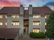 Well-maintained condo building showcasing updated exteriors and private balcony at 7379 S Gore Range Rd # 304, Littleton, CO 80127