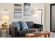 Comfortable living room showcases a gray sofa, stylish decor, and natural light at 7379 S Gore Range Rd # 304, Littleton, CO 80127