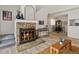 Inviting living room with stone fireplace and stylish decor at 7379 S Gore Range Rd # 304, Littleton, CO 80127