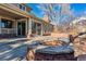 Stone firepit and patio perfect for outdoor enjoyment at 6150 S Fulton St, Englewood, CO 80111