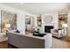 Living room with fireplace and large windows at 6150 S Fulton St, Englewood, CO 80111