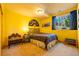 Bedroom features unique decor, carpet floors, and a window view at 6752 S Columbine Rd, Evergreen, CO 80439