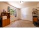 Carpeted bedroom with large windows and room for study and play at 6752 S Columbine Rd, Evergreen, CO 80439