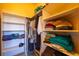 Walk-in closet with multiple shelves and hanging storage at 6752 S Columbine Rd, Evergreen, CO 80439