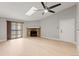 Living room features a fireplace, sliding glass doors to the outside at 8600 E Alameda Ave # 22-208, Denver, CO 80247