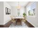 Bright dining room with natural light and modern furniture at 12714 E Dickenson Ave, Aurora, CO 80014