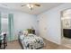 Cozy bedroom featuring a twin bed with an animal theme, a ceiling fan, and ample natural light at 713 San Juan Dr, Lafayette, CO 80026