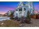Attractive blue two-story home with a welcoming front porch in a pleasant neighborhood setting at 713 San Juan Dr, Lafayette, CO 80026