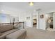Open loft space with cozy seating, view to Primary bedroom, and convenient access to the laundry room at 713 San Juan Dr, Lafayette, CO 80026