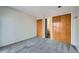 Neutral bedroom with plush carpet, ample closet space, and ensuite access at 9295 W 80Th Pl # A, Arvada, CO 80005