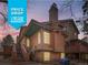 Charming multi-story townhouse with wood siding, offering a one year home warranty and a recent price drop at 9295 W 80Th Pl # A, Arvada, CO 80005